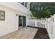 Back patio featuring sliding glass doors and white picket fence at 8510 Castle Pine Ct, Charlotte, NC 28226