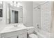 Bright bathroom with white subway tile, updated fixtures, and a clean, modern design at 8510 Castle Pine Ct, Charlotte, NC 28226