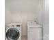Convenient laundry room equipped with modern washer and dryer, making chores a breeze at 8524 Emerald Fern Way, Charlotte, NC 28214