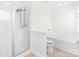 Bright bathroom featuring tile floor, shower, tub and toilet at 9641 Bellamy Nw Pl, Concord, NC 28027