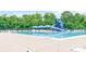 Community pool with a large slide and plenty of lounge chairs at 9641 Bellamy Nw Pl, Concord, NC 28027