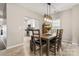 Light and airy dining room with access to the stainless steel kitchen and an amazing view at 9651 Bailey Rd, Cornelius, NC 28031