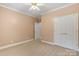 Bedroom with carpet and double closets at 105 Stumpy Creek Rd, Mooresville, NC 28117