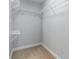 Spacious walk-in closet featuring wire shelving and ample storage space for clothes and accessories at 105 Stumpy Creek Rd, Mooresville, NC 28117