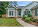 Charming single-story home with well-maintained landscaping and a welcoming entrance at 105 Stumpy Creek Rd, Mooresville, NC 28117