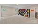 Spacious bonus room offering versatility and an abundance of natural light at 117 Walking Horse Trl, Davidson, NC 28036