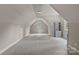 Finished attic space with neutral paint and plush carpet flooring at 117 Walking Horse Trl, Davidson, NC 28036