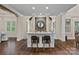 Kitchen bar area featuring an island with seating and lots of natural light at 117 Walking Horse Trl, Davidson, NC 28036