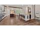 Spacious kitchen with granite countertops, a large island, and stainless steel appliances at 117 Walking Horse Trl, Davidson, NC 28036