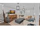 Stylish living room with modern fixtures, hardwood flooring, and a neutral color palette at 117 Walking Horse Trl, Davidson, NC 28036