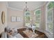 Bright office space with large windows, hardwood floors, and neutral decor at 117 Walking Horse Trl, Davidson, NC 28036