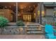 Outdoor patio featuring stone steps, a grill area, and an inviting outdoor space at 117 Walking Horse Trl, Davidson, NC 28036