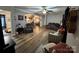 Inviting living room with hardwood floors, comfortable seating, and an open layout at 13219 Asbury Chapel Rd, Huntersville, NC 28078