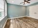 Bedroom featuring hardwood floors, fresh paint, and window at 1326 Crown Ridge Dr, Fort Mill, SC 29708