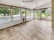 Sunroom with ceiling fans and multiple windows at 1326 Crown Ridge Dr, Fort Mill, SC 29708