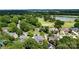 Aerial view showcasing the proximity to the golf course and lake at 1522 12Th Fairway Nw Dr, Concord, NC 28027