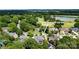 Aerial view of home and surrounding neighborhood near the golf course and lake at 1522 12Th Fairway Nw Dr, Concord, NC 28027