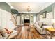 Inviting living room with hardwood floors, neutral decor, and ample natural light at 1522 12Th Fairway Nw Dr, Concord, NC 28027