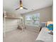 Bedroom with ceiling fan, carpeted floor and bunk bed by the window at 15515 Laverack Ln, Davidson, NC 28036