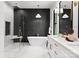 Stunning bathroom features a sleek, modern design with a freestanding tub and glass-enclosed shower at 1626 Burtonwood Cir, Charlotte, NC 28212