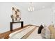 Well-lit bedroom featuring modern decor, hardwood floors, and stylish accents at 1626 Burtonwood Cir, Charlotte, NC 28212