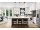 Bright kitchen featuring a large island, pendant lighting, and stainless steel appliances at 1626 Burtonwood Cir, Charlotte, NC 28212