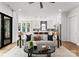 Cozy living room with modern decor and an open layout leading to the kitchen at 1626 Burtonwood Cir, Charlotte, NC 28212