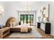Main bedroom with wood floors, balcony access with nature views, modern lighting fixtures and light neutral colors at 1626 Burtonwood Cir, Charlotte, NC 28212