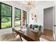 Inviting home office features a spacious desk, comfortable seating, and abundant natural light at 1626 Burtonwood Cir, Charlotte, NC 28212