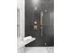 Close-up of a modern shower with detailed tile work, rainfall showerhead, and built-in seat at 1626 Burtonwood Cir, Charlotte, NC 28212