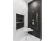 Modern shower showcases tile work, a rainfall showerhead, and a built-in niche for storage at 1626 Burtonwood Cir, Charlotte, NC 28212
