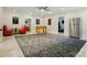 Large, updated game room featuring a foosball table, lounge chairs, and an oversized area rug at 167 Logan Crossing Dr, Davidson, NC 28036