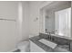 Bathroom featuring grey granite countertop, white cabinets and a shower at 1723 Rhyneland Cir, Gastonia, NC 28054