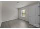 Bright bedroom with natural light, modern flooring, and a minimalist design at 1723 Rhyneland Cir, Gastonia, NC 28054