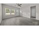 Inviting living room with plenty of light, stylish floors, and a welcoming entrance at 1723 Rhyneland Cir, Gastonia, NC 28054