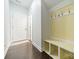 Functional mudroom features built-in bench seating with storage and convenient coat hooks at 1812 Sutter Creek Dr, Waxhaw, NC 28173