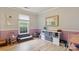 Spacious room perfect for children, featuring light hardwood floors and plenty of storage at 1821 Bonnie Ln, Charlotte, NC 28213