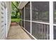Exterior view of the screened porch with a view to the outdoors at 1821 Bonnie Ln, Charlotte, NC 28213