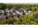 Aerial view of modern homes surrounded by lush greenery in a peaceful residential neighborhood at 2011 Hamorton Pl, Charlotte, NC 28205
