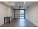 Open garage features storage and a garage door that lets in plenty of light at 2011 Hamorton Pl, Charlotte, NC 28205