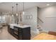 Spacious kitchen features a large island, modern appliances, and an open floor plan layout at 2011 Hamorton Pl, Charlotte, NC 28205
