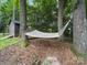 Relax in your own backyard hammock strung between mature trees in a shady area on a bed of pine straw at 2026 Knell Dr, Charlotte, NC 28212
