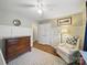 Bedroom showcases hardwood floors, white board and batten accent wall and neutral color palette at 2026 Knell Dr, Charlotte, NC 28212
