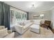 Spacious living room featuring a large window and comfortable seating at 2026 Knell Dr, Charlotte, NC 28212