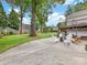 Spacious backyard featuring a patio, outdoor seating, and a well-maintained lawn at 2112 Chatham Ave, Charlotte, NC 28205