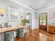 Bright entryway with hardwood floors, stylish decor, and ample natural light at 2112 Chatham Ave, Charlotte, NC 28205