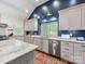 Bright kitchen with stainless steel appliances, light countertops, and modern finishes at 2112 Chatham Ave, Charlotte, NC 28205