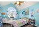 Bright bedroom features an arched window, wood-look floors, and themed decor at 220 Otman Ct, Rock Hill, SC 29732