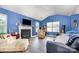 Cozy living room with a fireplace, TV and lots of light at 220 Otman Ct, Rock Hill, SC 29732
