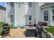 Back patio of home, features grilling space and outdoor furniture at 220 Otman Ct, Rock Hill, SC 29732